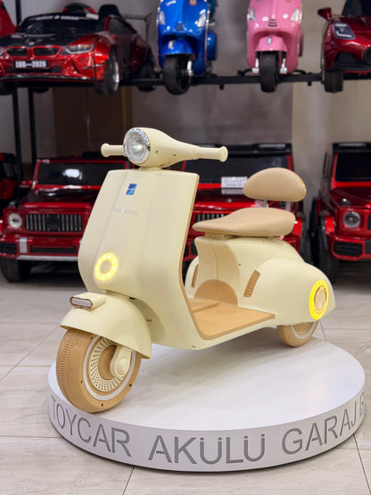 VESPA AKÜLÜ MOTOR 12W 3-9 YAŞ KREM