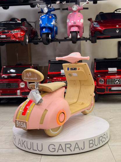 VESPA AKÜLÜ MOTOR 12W 3-9 YAŞ PEMBE