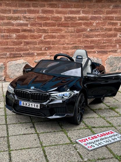 ORJİNAL LİSANSLI BMW M5  AKÜLÜ ARABA 24W 0-6 YAŞ SİYAH